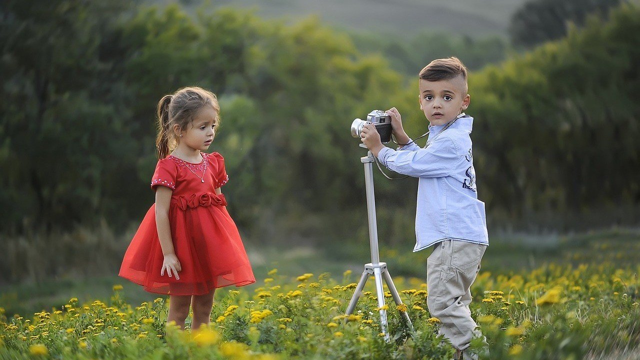 Children playing and expressing gender beyond stereotypes with feminine boys and masculine girls Children playing and expressing gender beyond stereotypes with feminine boys and masculine girls